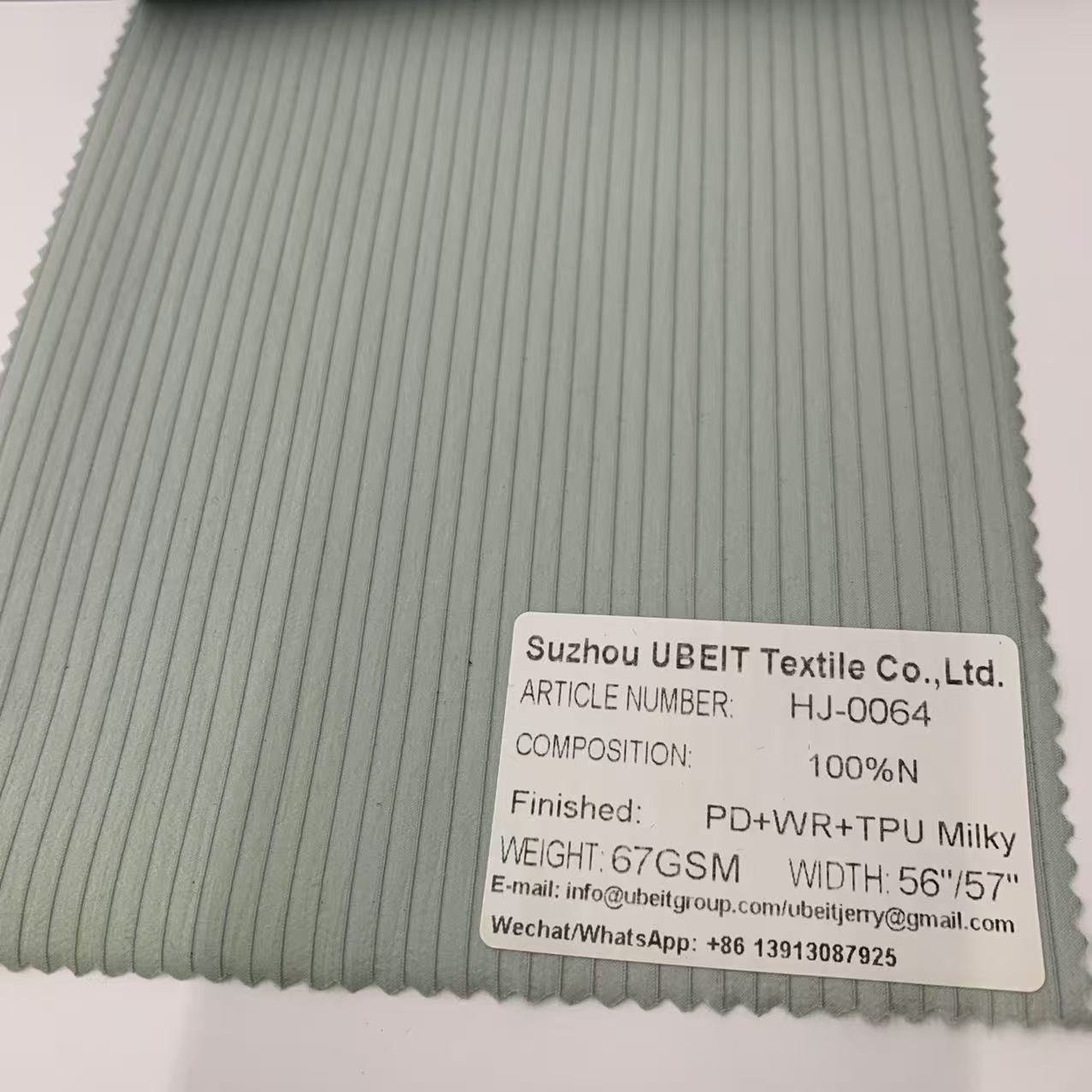 HJ-0064 100%N PD+WR+TPU Milky fabric