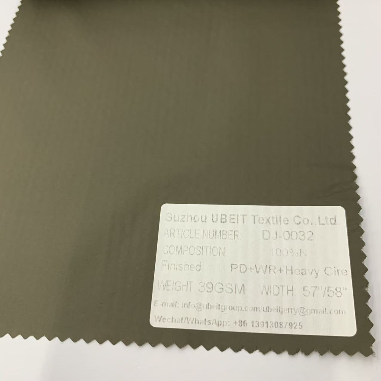 DJ-0032 100%N PD+WR+Heavy Cire fabric